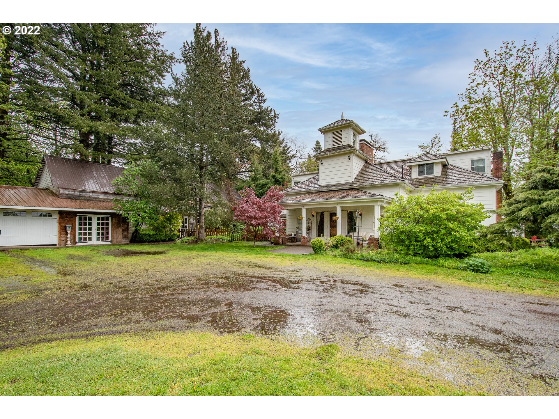 181 Marble Road Washougal, WA 98671 - Photo 2 of 32 a front view of a house with a garden