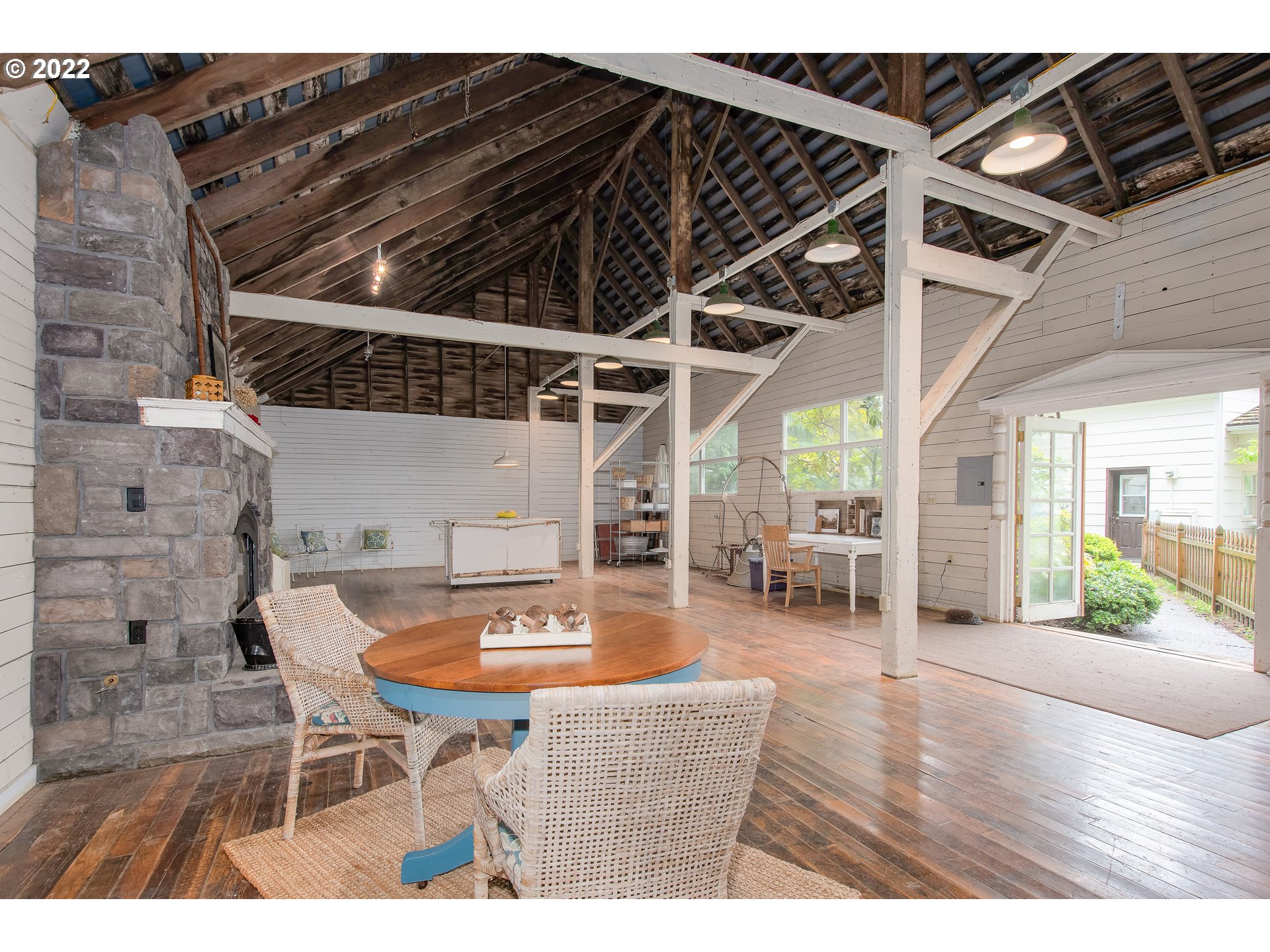181 Marble Road Washougal, WA 98671 - Photo 25 of 32 a dinning table and chairs in the patio of a house