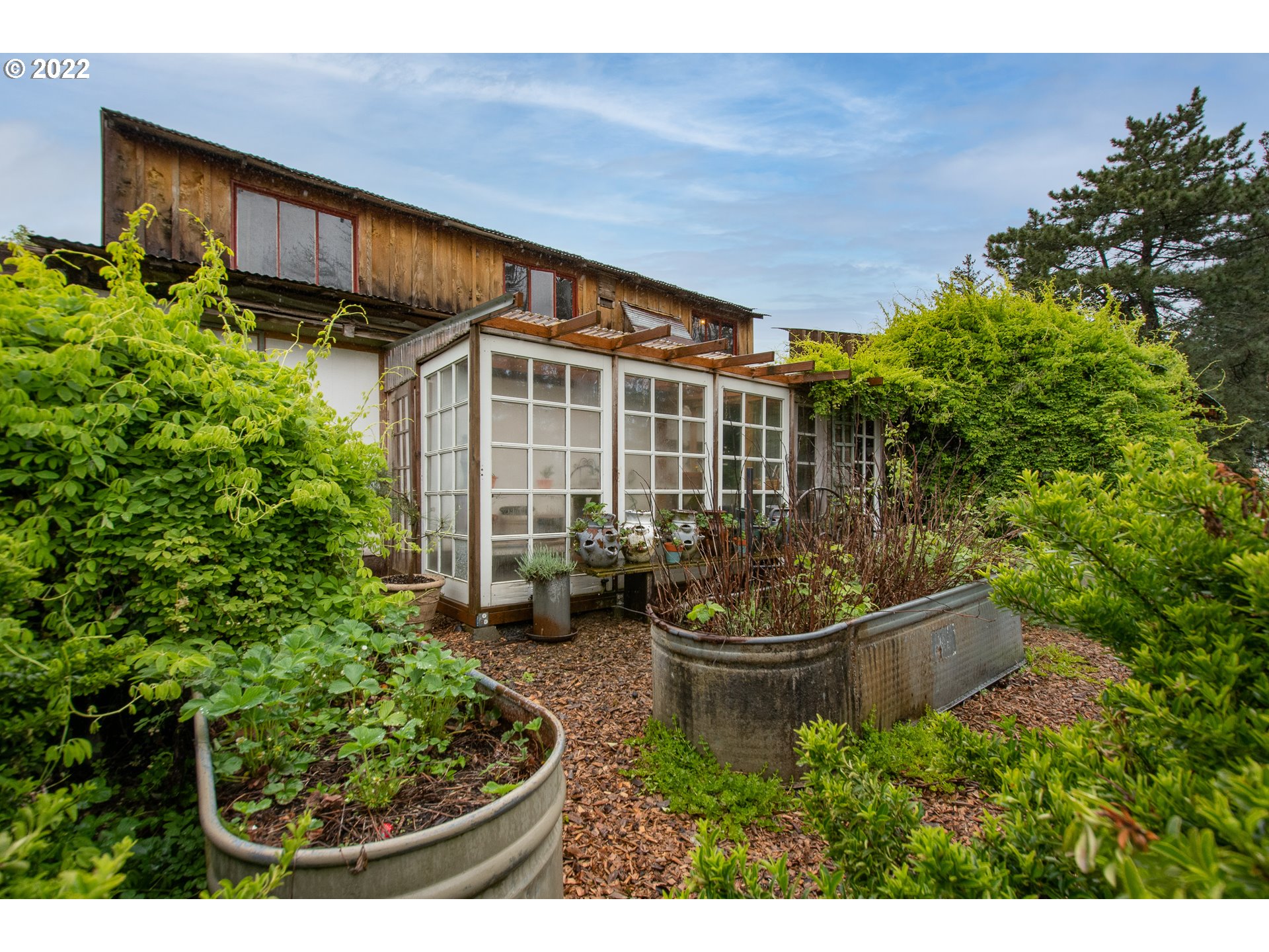 181 Marble Road Washougal, WA 98671 - Photo 30 of 32 a view of a backyard with plants