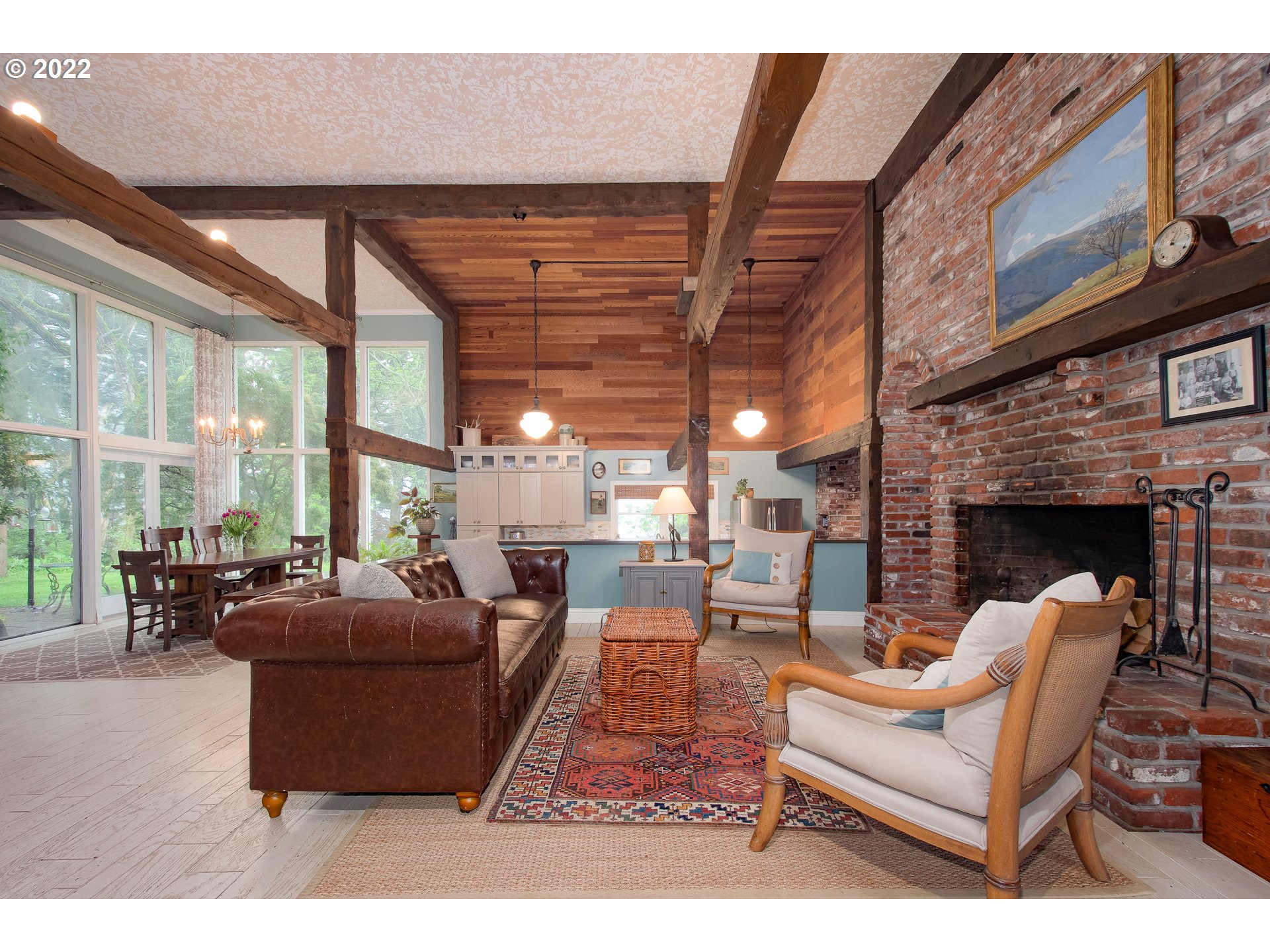 181 Marble Road Washougal, WA 98671 - Photo 5 of 32 a living room with fireplace furniture and a large window