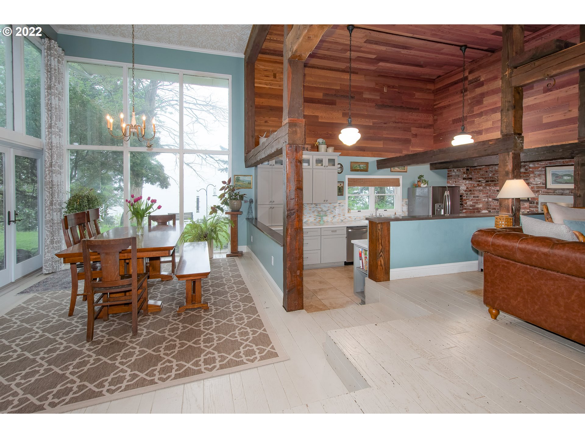 181 Marble Road Washougal, WA 98671 - Photo 6 of 32 a view of a dining room with furniture a chandelier and window