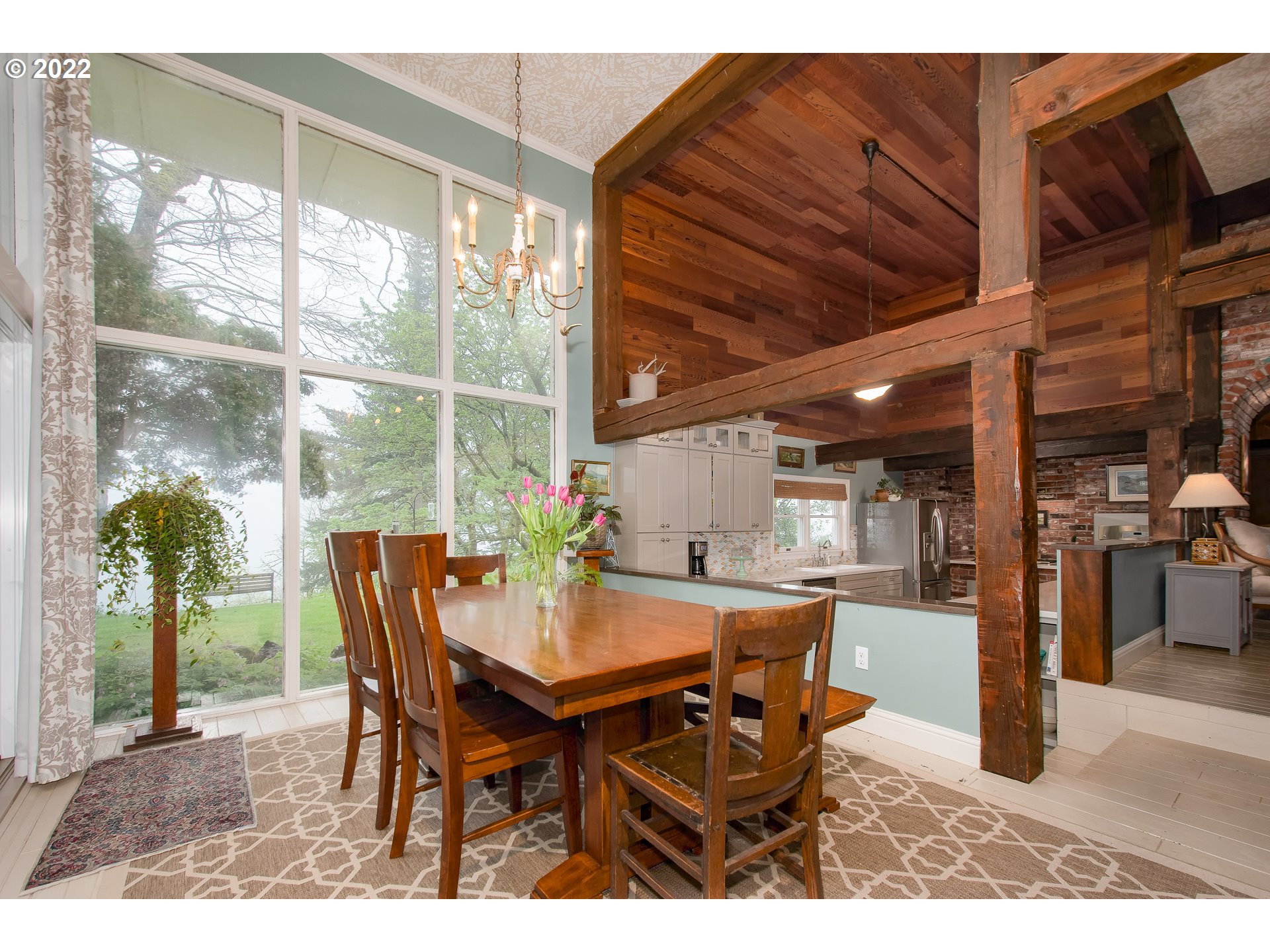 181 Marble Road Washougal, WA 98671 - Photo 8 of 32 a dining room with furniture and wooden floor