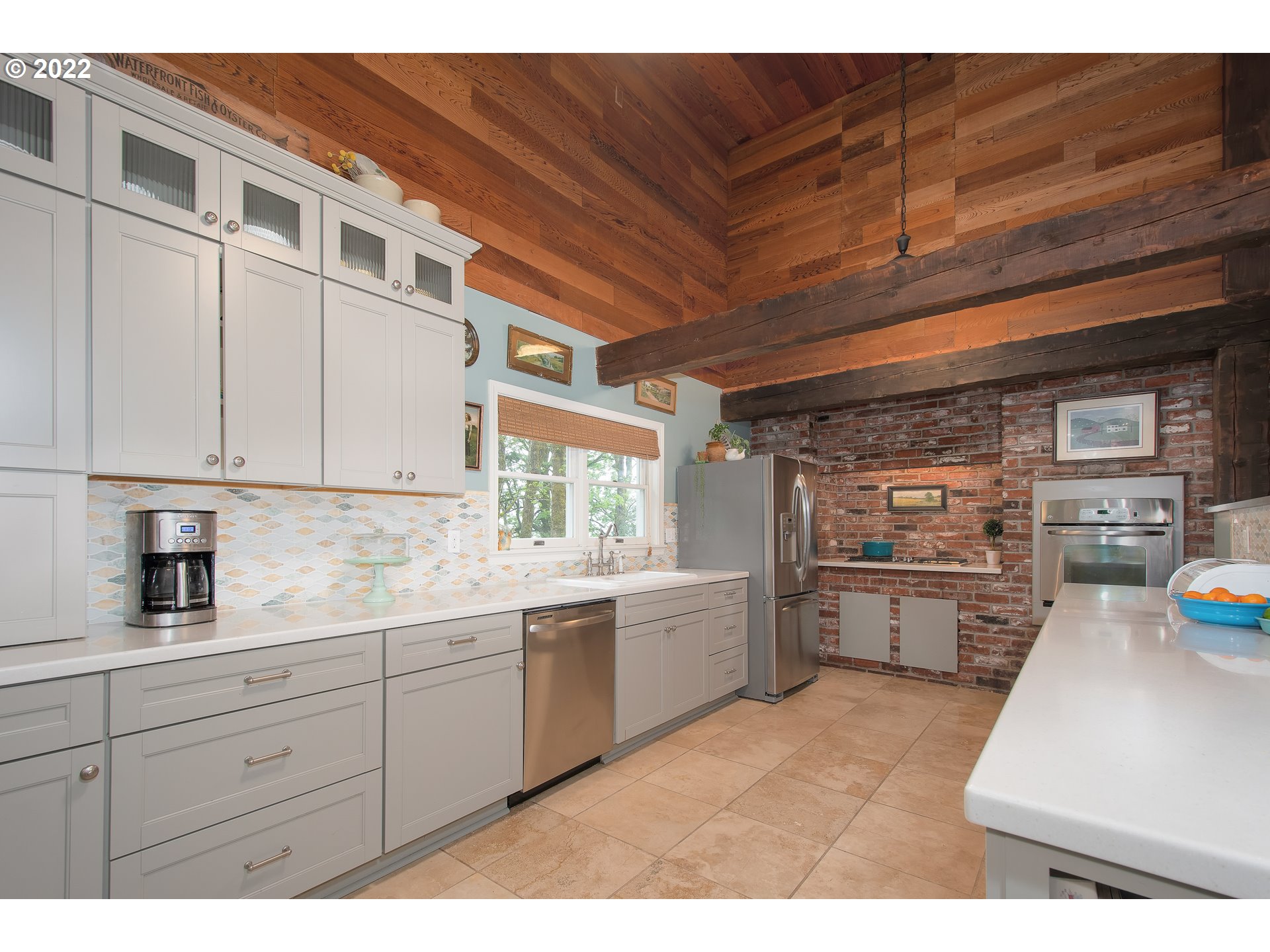 181 Marble Road Washougal, WA 98671 - Photo 9 of 32 a kitchen with stainless steel appliances granite countertop a sink window and cabinets