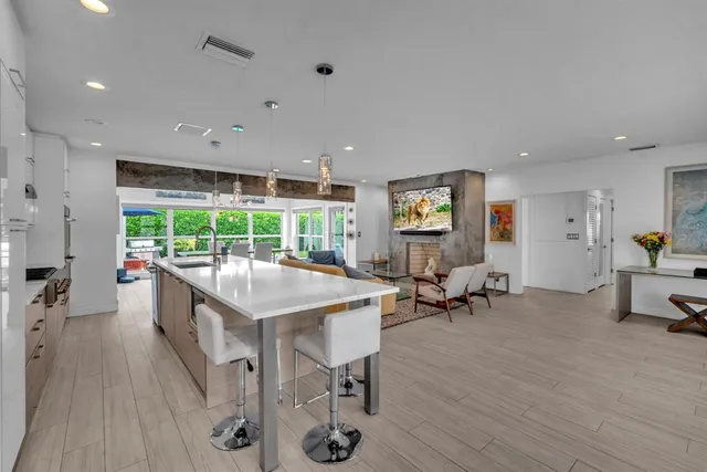 a room with furniture and a large window