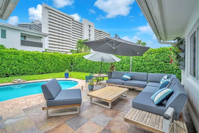 a patio with patio area and a garden