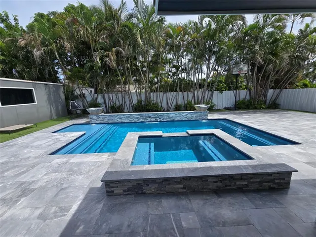 a view of outdoor space with swimming pool