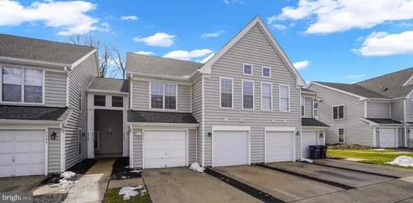 a view of a house with a street