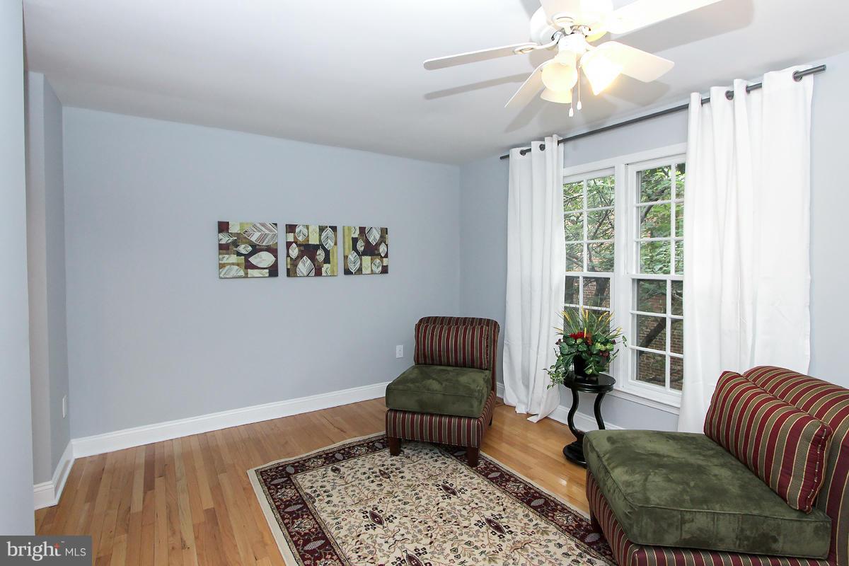 2428 South Walter Reed Drive, Unit A Arlington, VA 22206 - Photo 20 of 30 a bedroom with furniture and a window