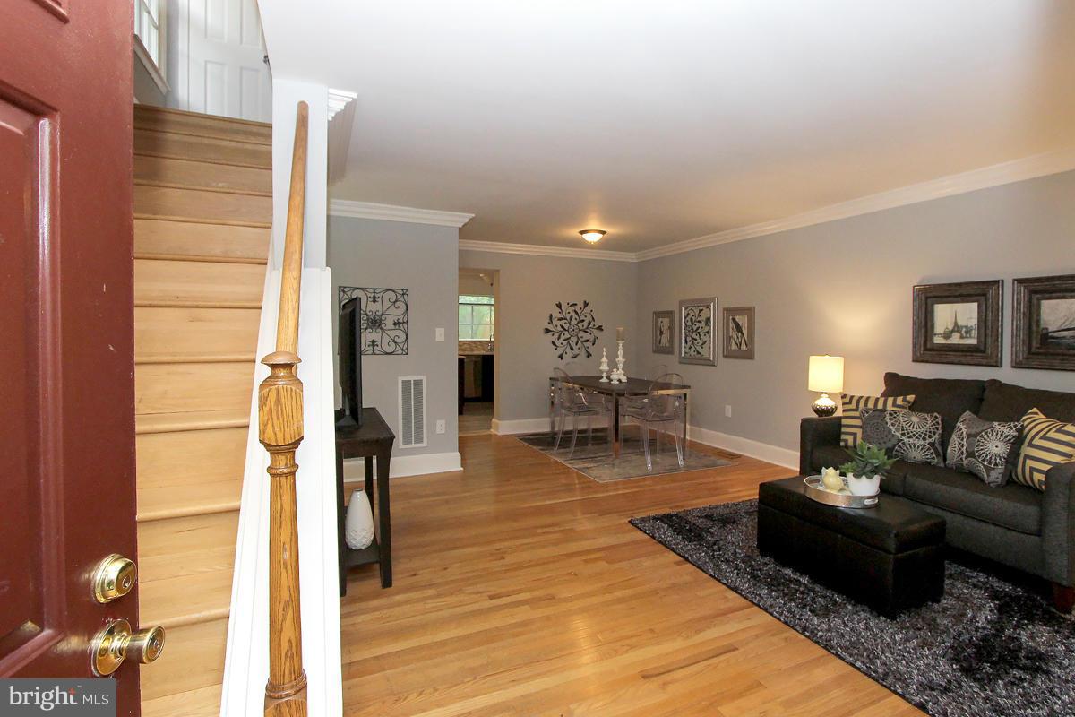 2428 South Walter Reed Drive, Unit A Arlington, VA 22206 - Photo 3 of 30 a living room with furniture