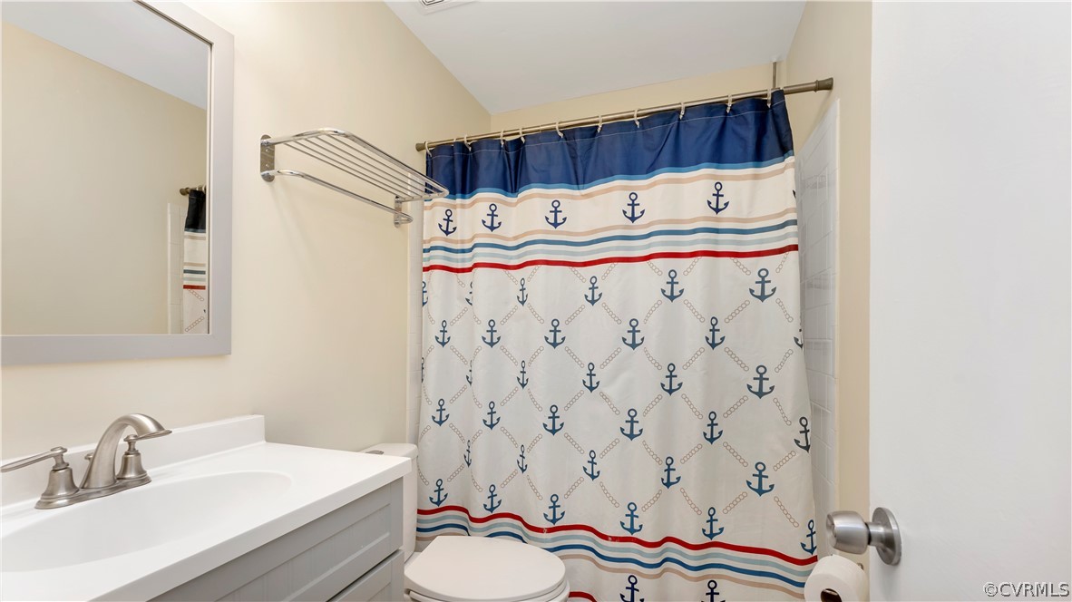 6212 Barrister Road Chesterfield, VA 23832 - Photo 7 of 19 a bathroom with a sink toilet and a mirror