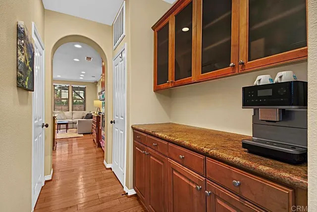a view of a kitchen cabinets and a stove