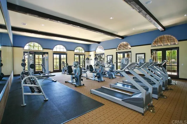 a swimming pool with outdoor seating