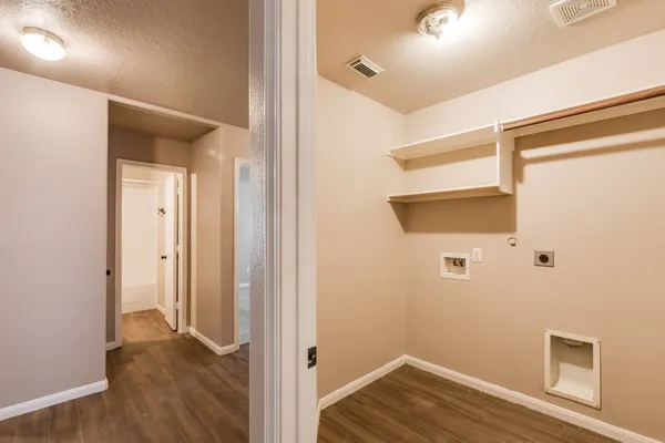 a view of small space with wooden floor