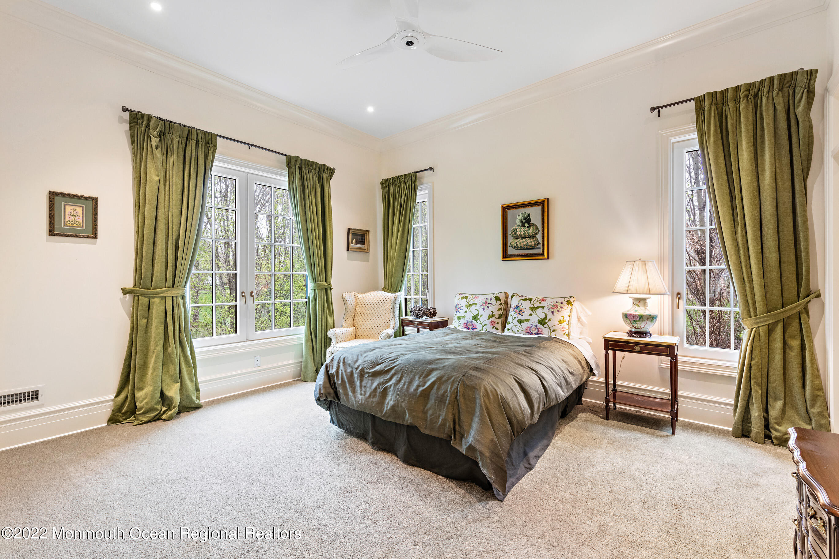 8 Edgewood Road Rumson, NJ 07760 - Photo 23 of 31 a spacious bedroom with a bed and a large window