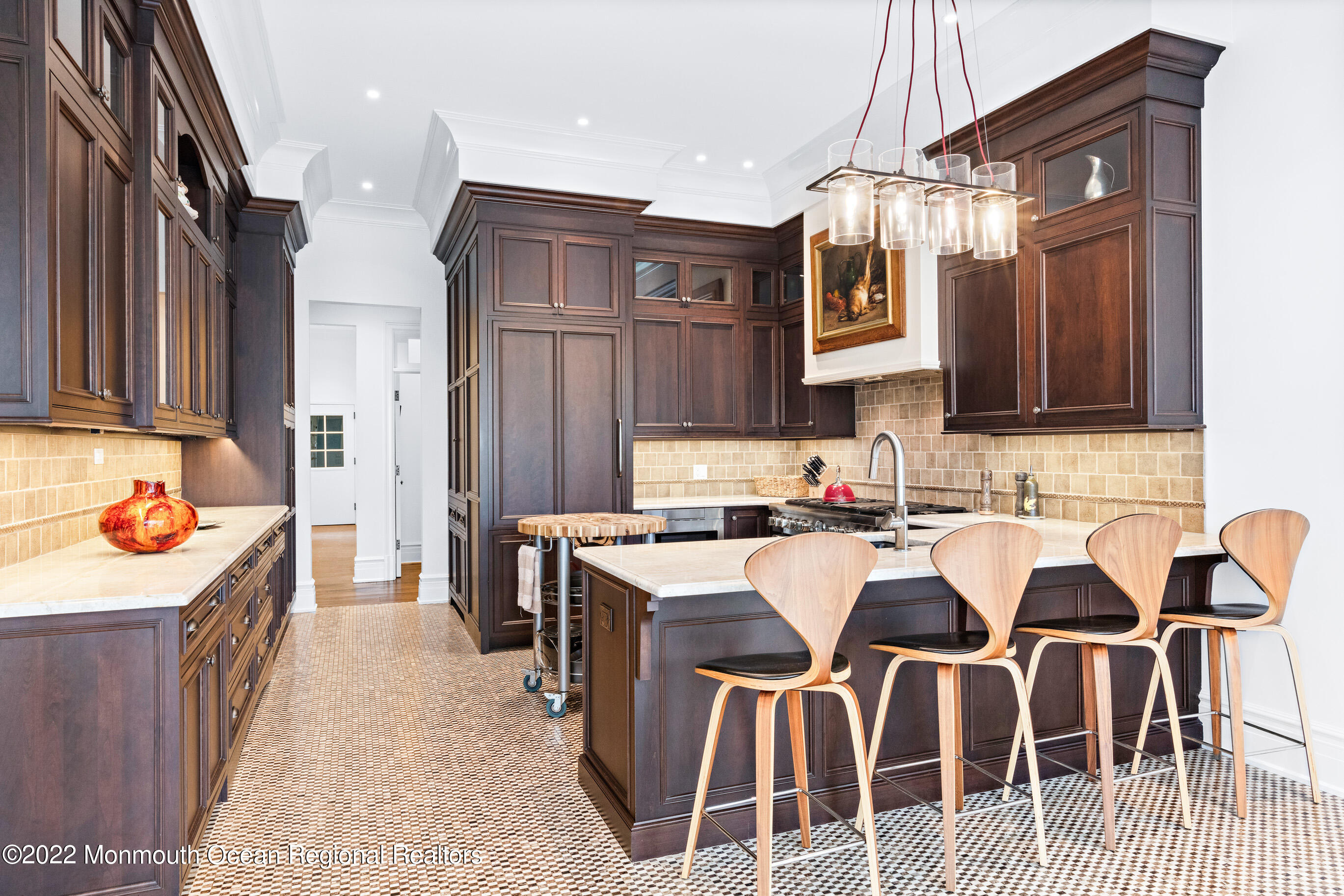 8 Edgewood Road Rumson, NJ 07760 - Photo 9 of 31 a kitchen that has a table and chairs in it