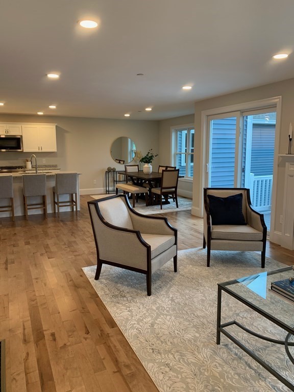 4 Putnam Road Hudson, NH 03051 - Photo 7 of 11 a living room with furniture and a couch
