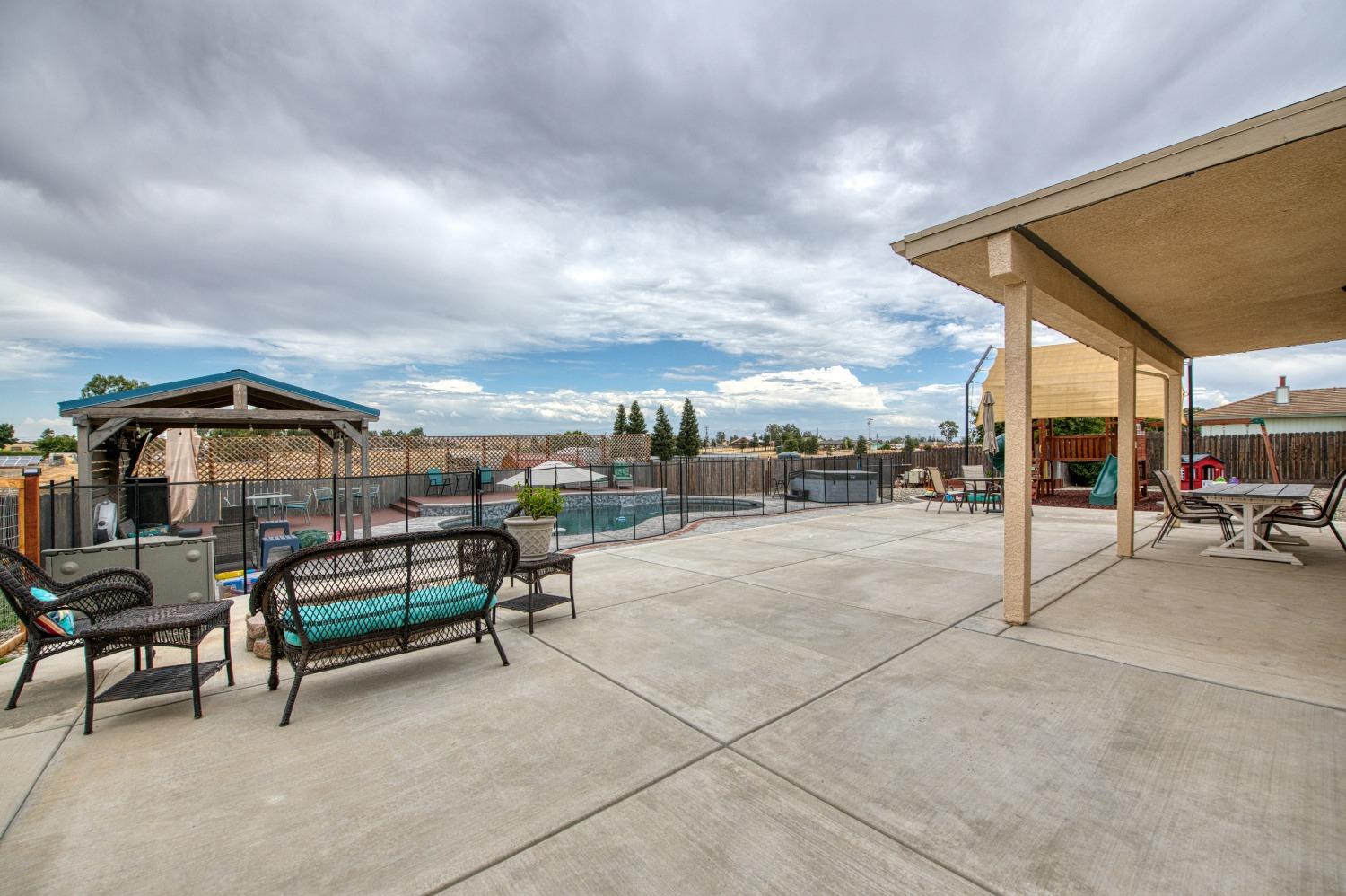 36919 Ave 17 1/2 Madera, CA 93636 - Photo 44 of 77 a view of a terrace with sitting area