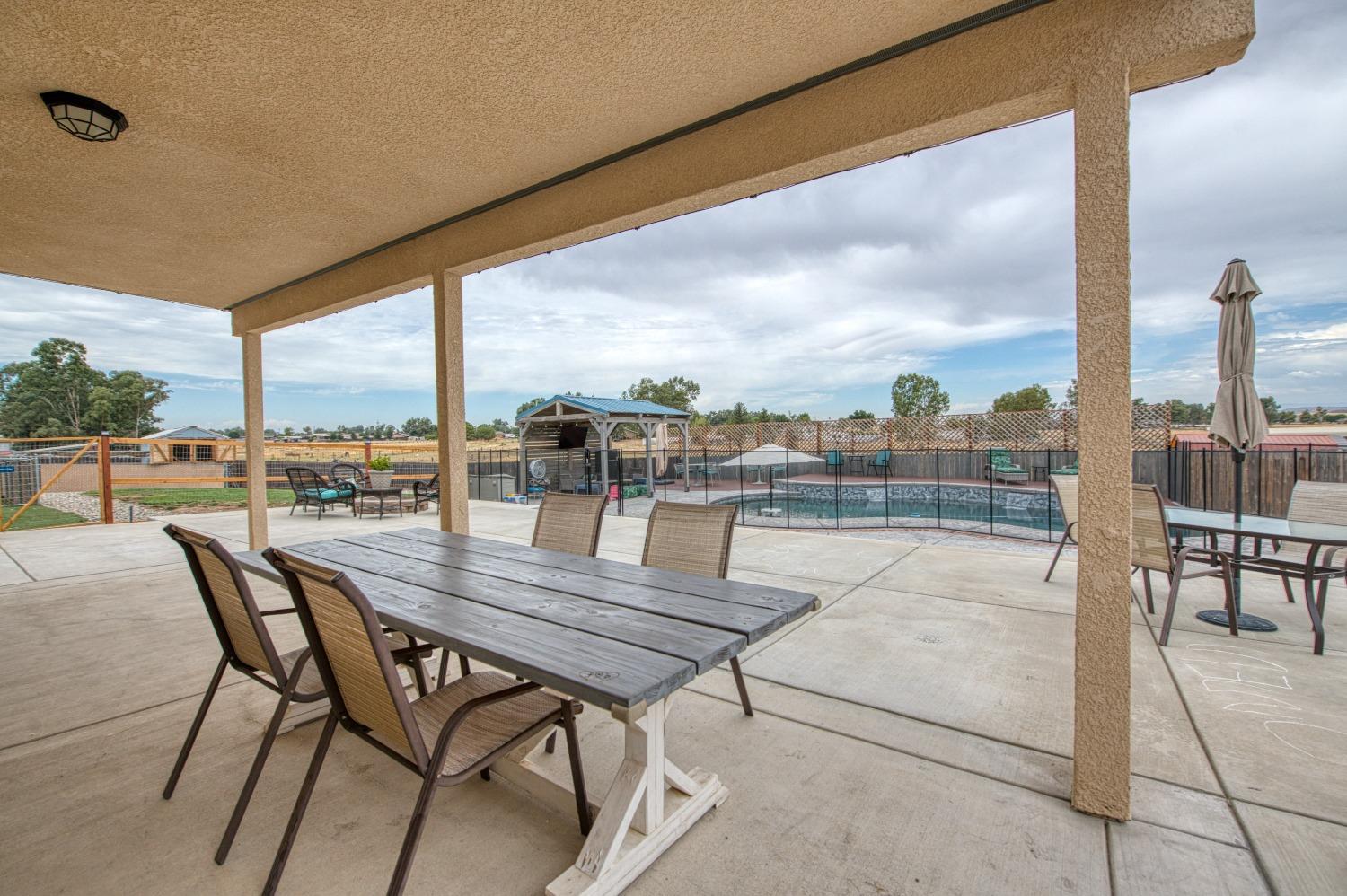 36919 Ave 17 1/2 Madera, CA 93636 - Photo 46 of 77 a outdoor view with a sitting space and sitting space