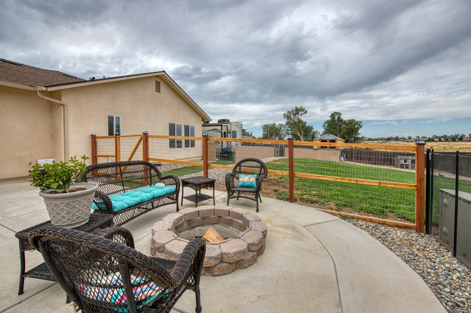 36919 Ave 17 1/2 Madera, CA 93636 - Photo 48 of 77 a view of a backyard with sitting area