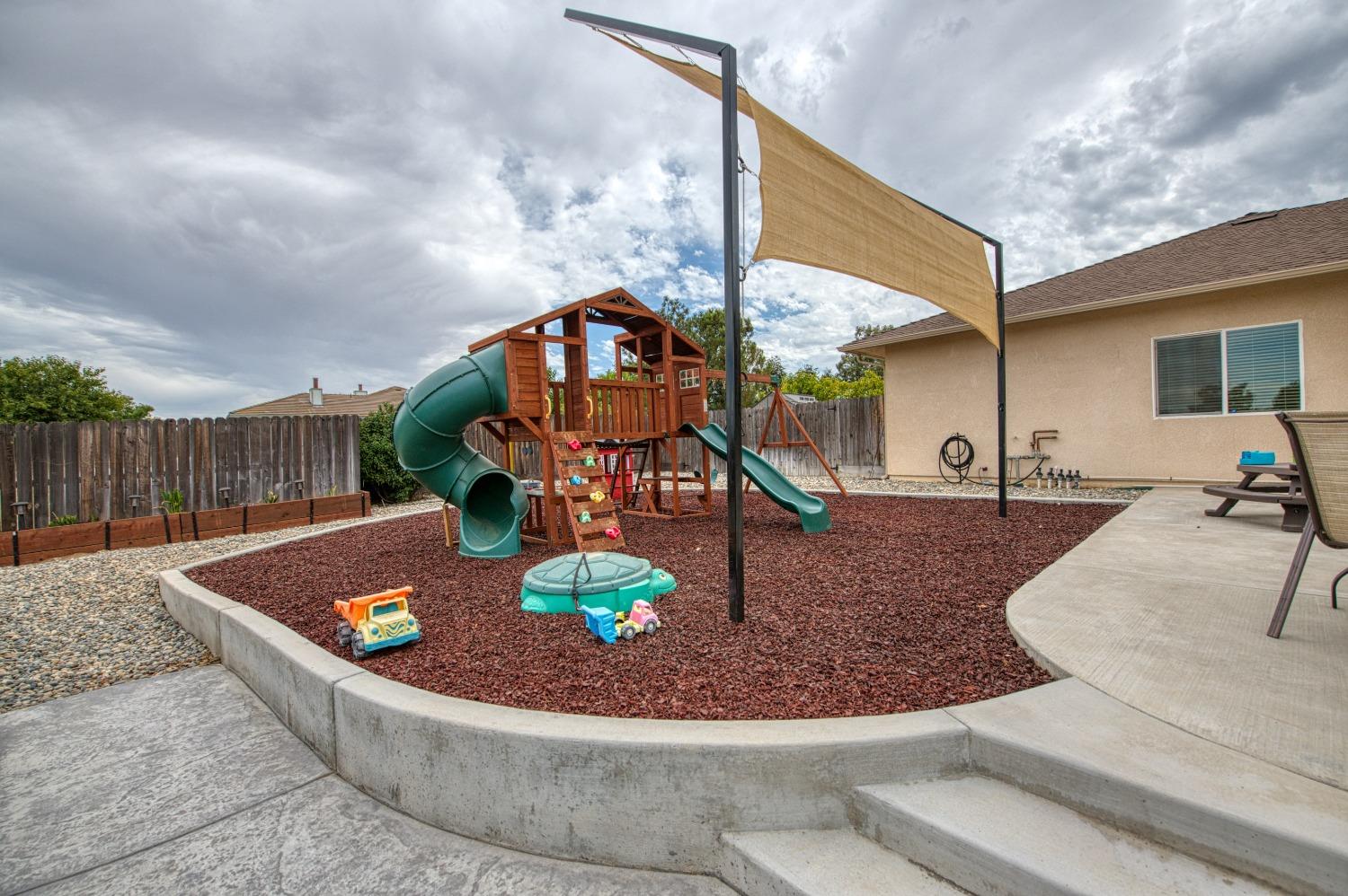 36919 Ave 17 1/2 Madera, CA 93636 - Photo 51 of 77 a view of a house with a swimming pool