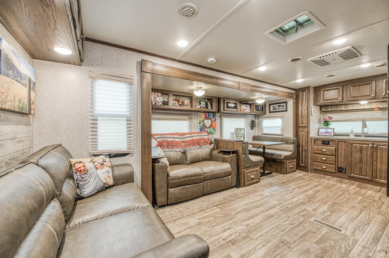 36919 Ave 17 1/2 Madera, CA 93636 - Photo 60 of 77 a living room with furniture and a large window