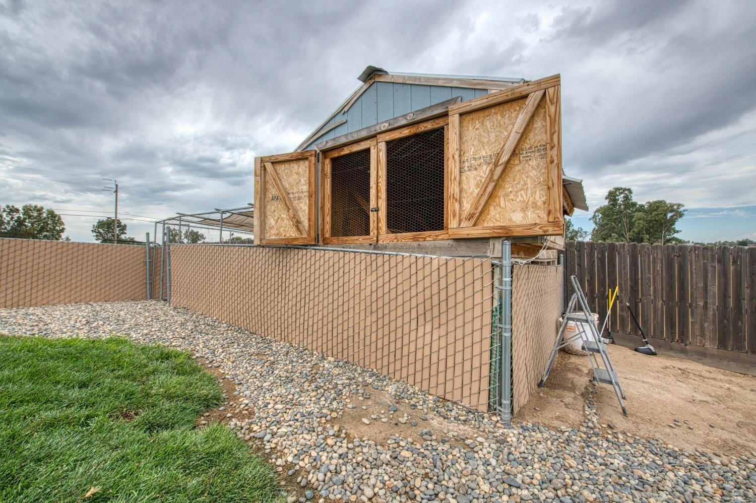 36919 Ave 17 1/2 Madera, CA 93636 - Photo 67 of 77 a front view of a house with a yard