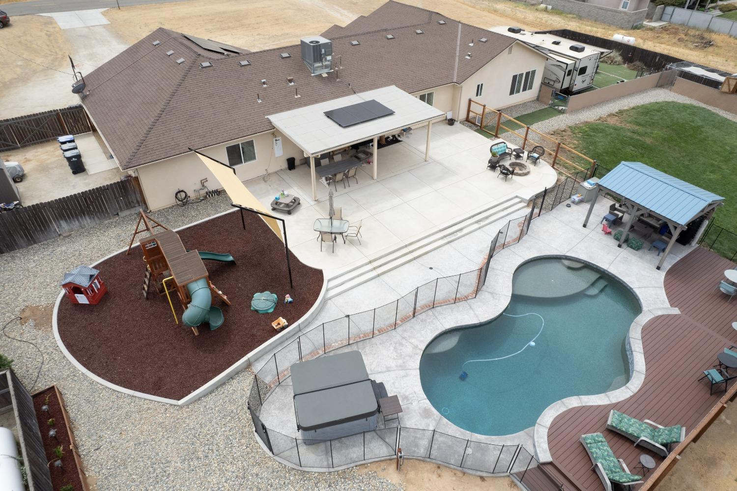36919 Ave 17 1/2 Madera, CA 93636 - Photo 72 of 77 an aerial view of a house with swimming pool