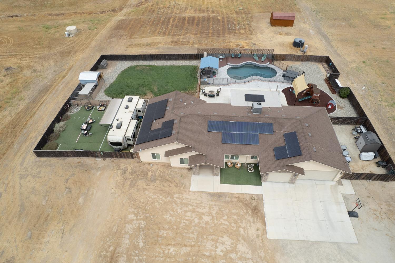 36919 Ave 17 1/2 Madera, CA 93636 - Photo 73 of 77 a view of living room with furniture and floor to ceiling window