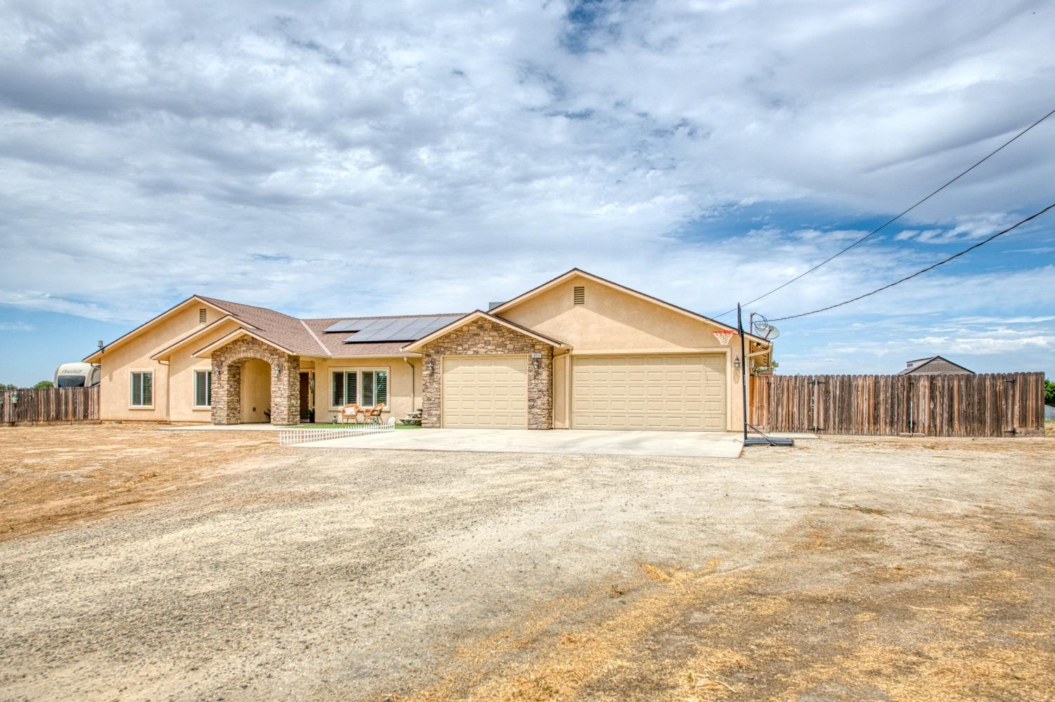 36919 Ave 17 1/2 Madera, CA 93636 - Photo 77 of 77 a big house with a big yard and large trees