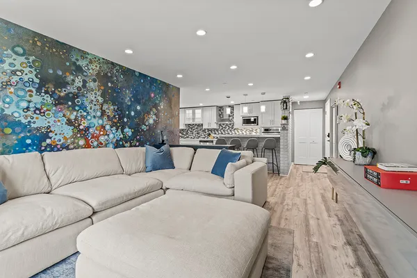 a bedroom with a bed window and television