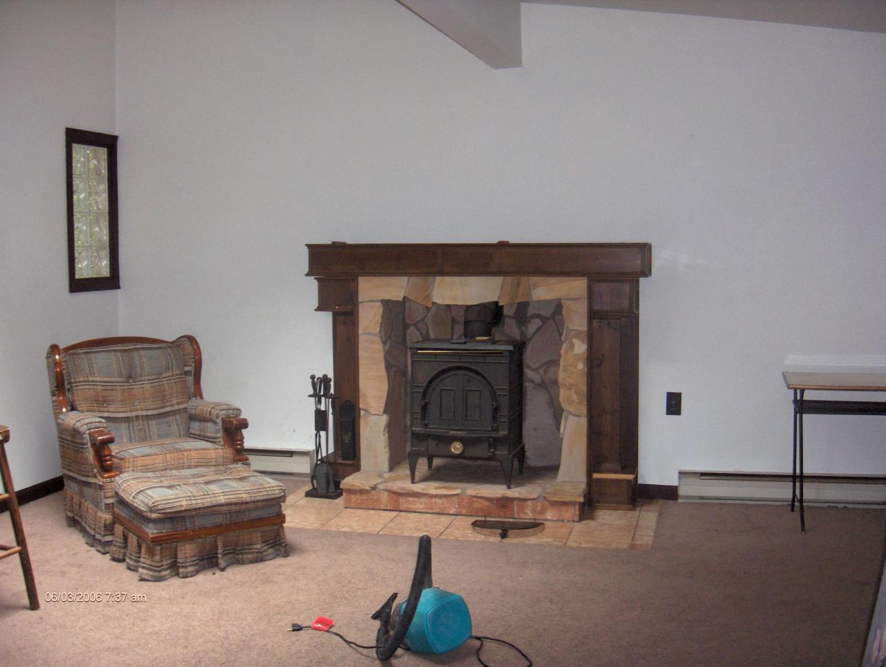 1342 Kroucher Road Stroudsburg, PA 18360 - Photo 8 of 8 a living room with furniture and a fireplace