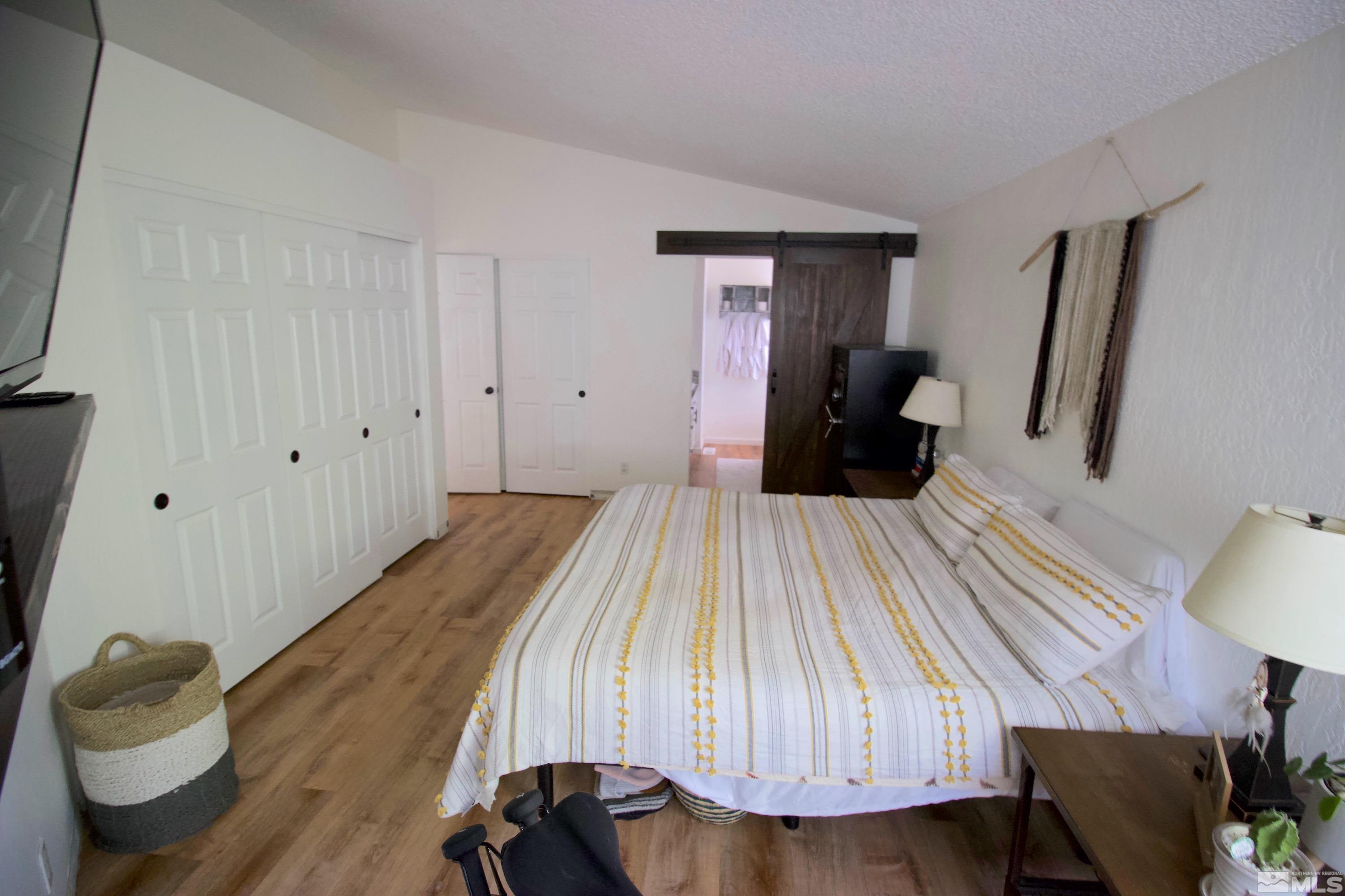 6350 Moon Ridge Terrace Reno, NV 89523 - Photo 15 of 19 a bedroom with a bed and a dresser
