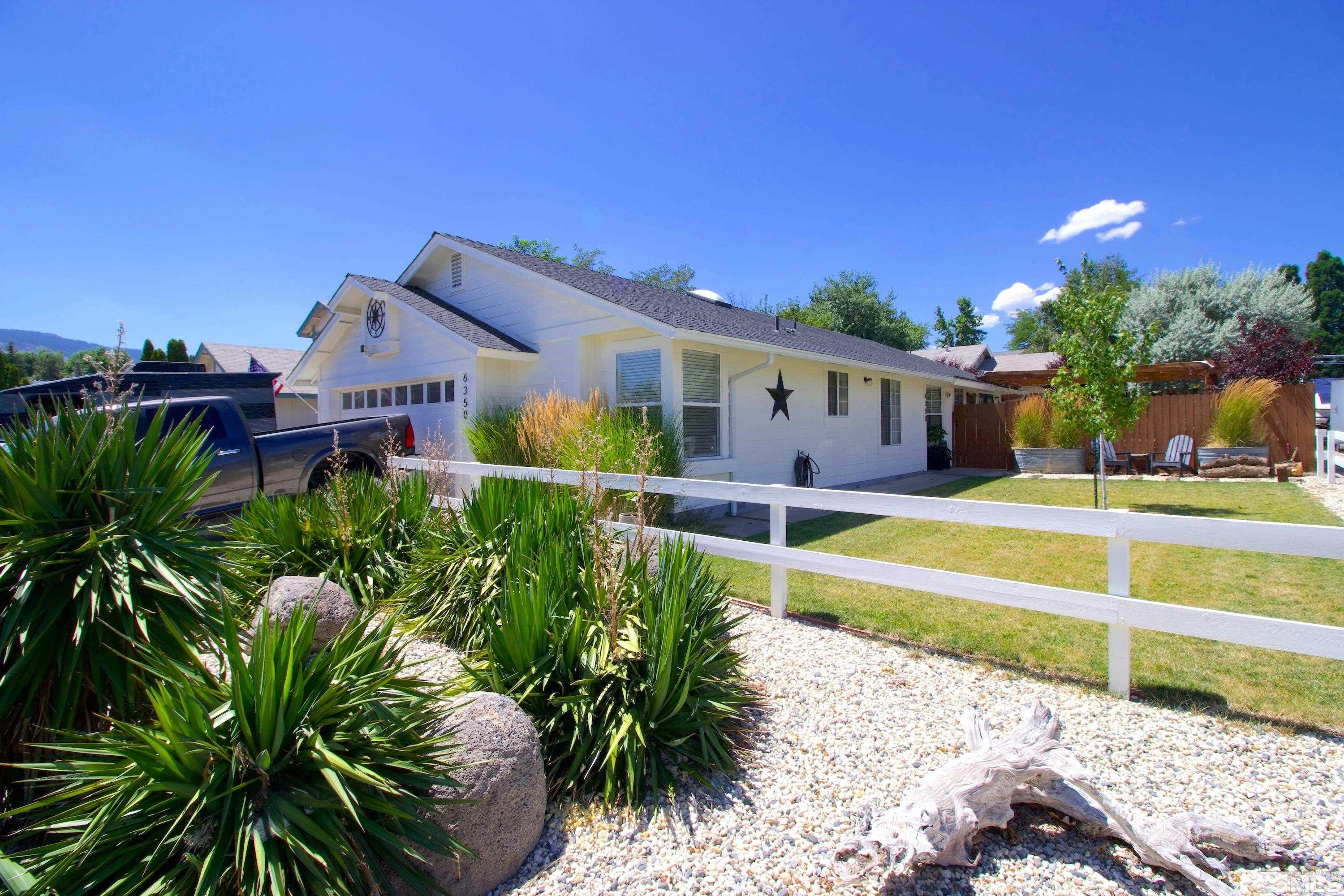 6350 Moon Ridge Terrace Reno, NV 89523 - Photo 19 of 19 a view of a house with a swimming pool