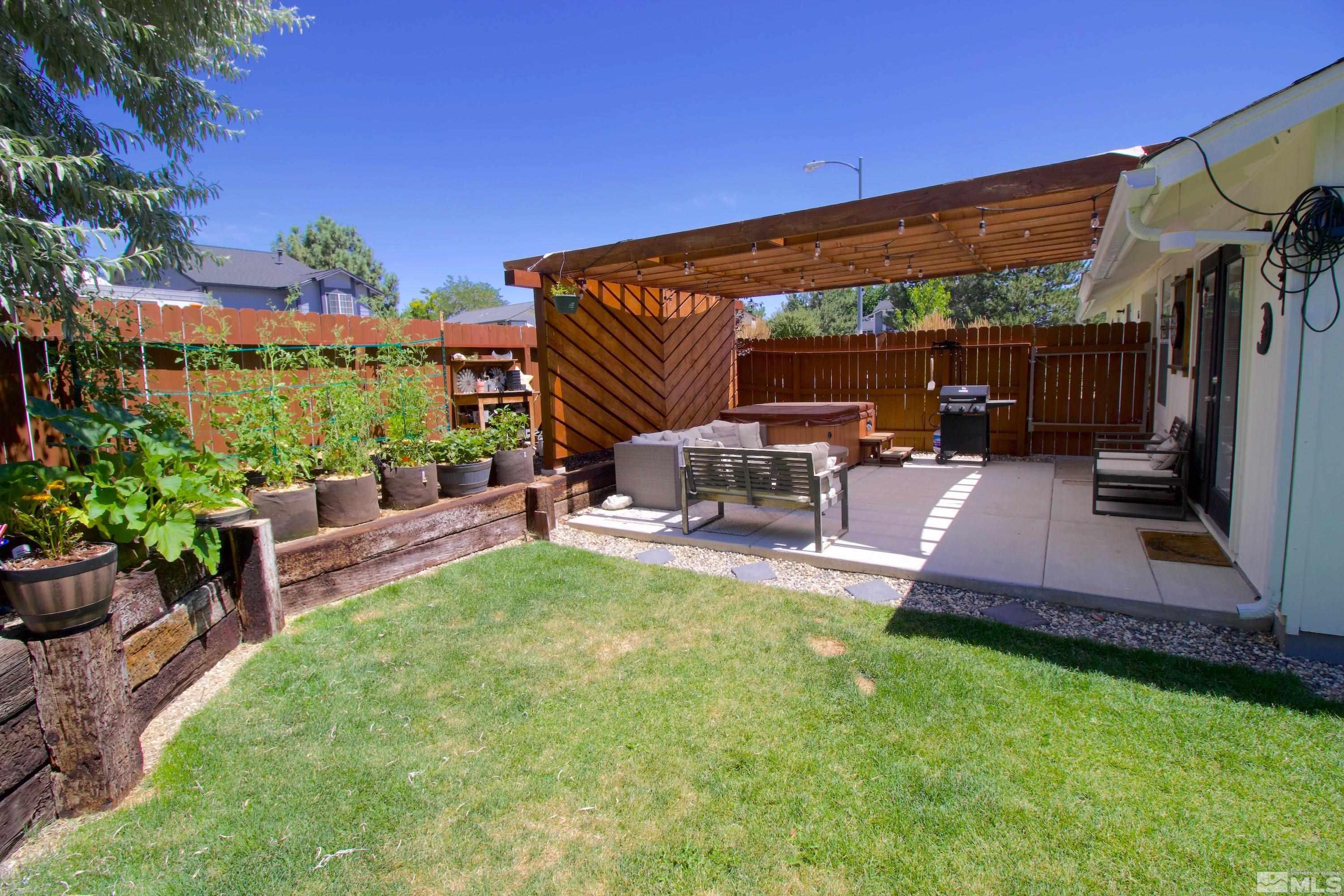 6350 Moon Ridge Terrace Reno, NV 89523 - Photo 3 of 19 a view of a backyard with sitting area