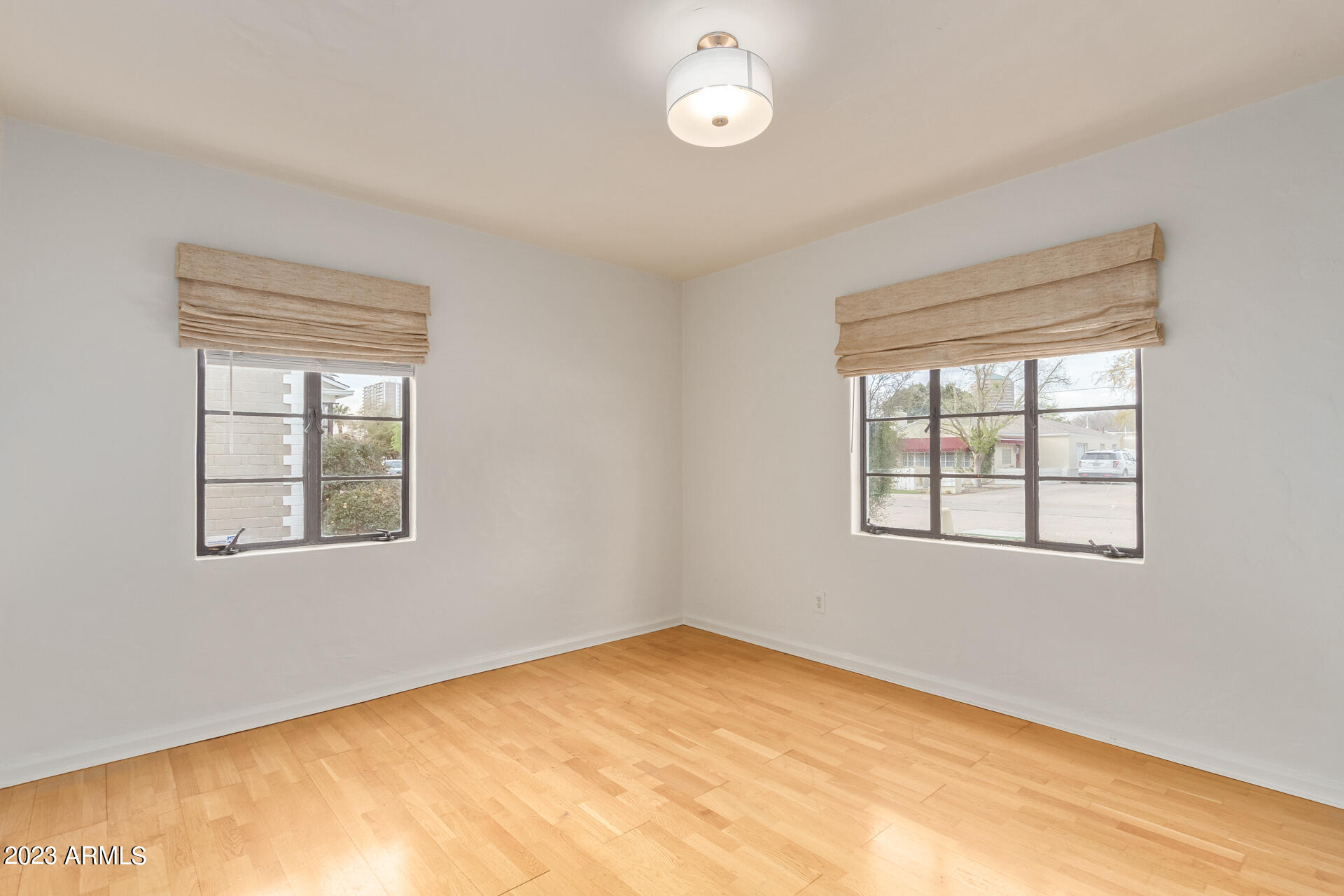 345 East Alvarado Road Phoenix, AZ 85004 - Photo 13 of 39 Natural light in primary bedroom
