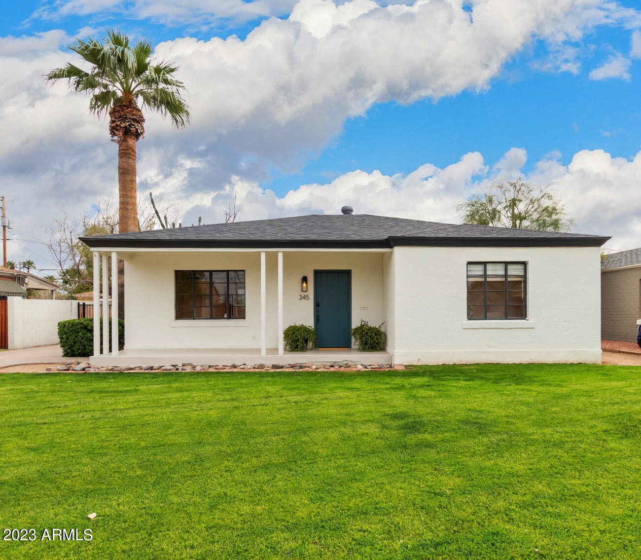 345 East Alvarado Road Phoenix, AZ 85004 - Photo 35 of 39 Front elevation w lush grass