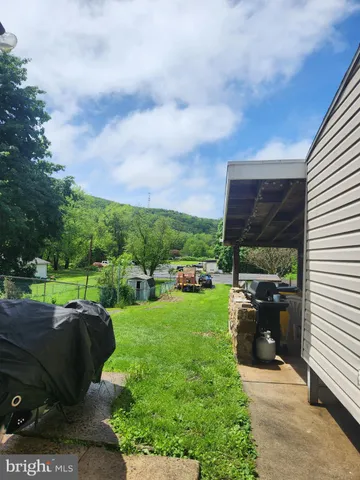 a view of a garden with a slide