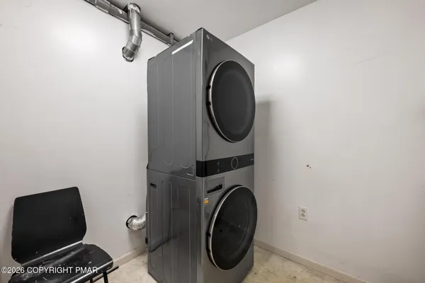 a bathroom with a sink toilet vanity and tub
