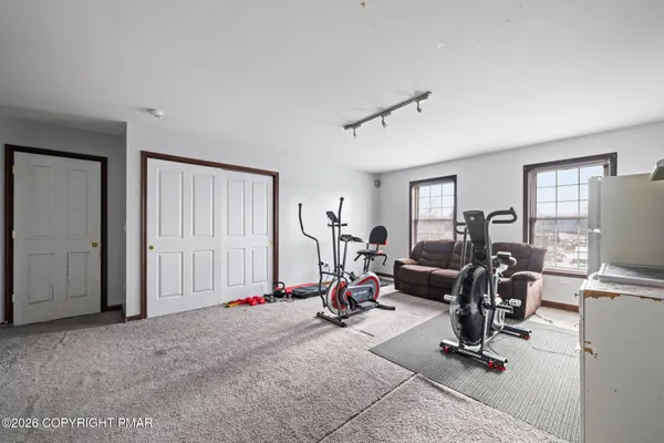 a view of a room with gym equipment