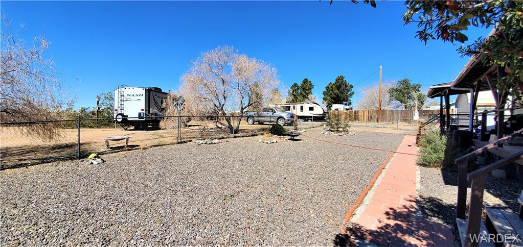 407 South Houck Road Golden Valley, AZ 86413 - Photo 29 of 65 a view of a road with a building in the background