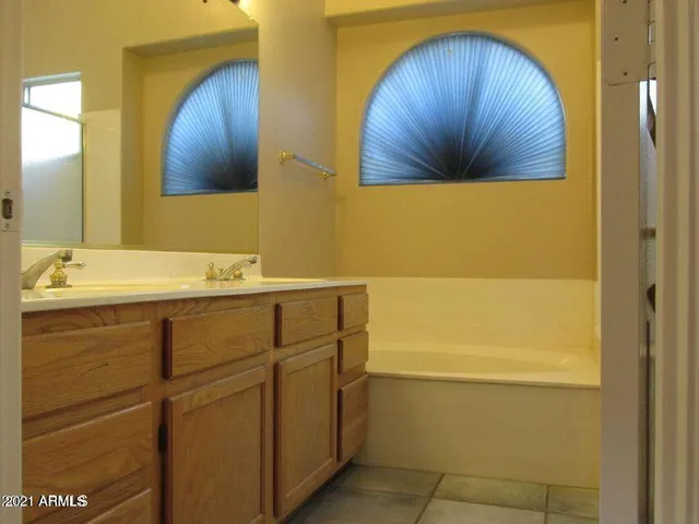 a bathroom with a sink and a bathtub