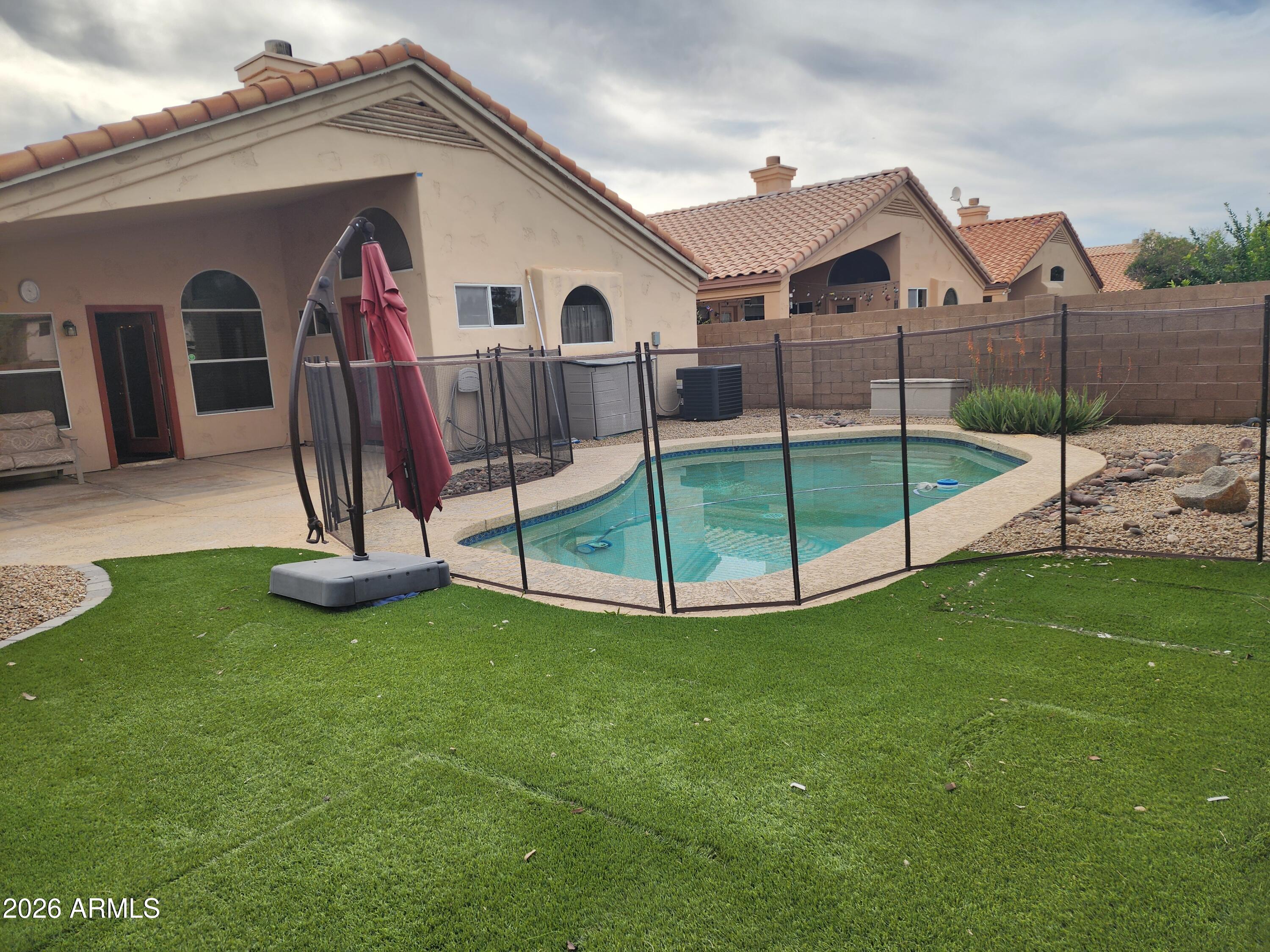 4790 West Tulsa Street Chandler, AZ 85226 - Photo 4 of 30 a view of a house with a yard