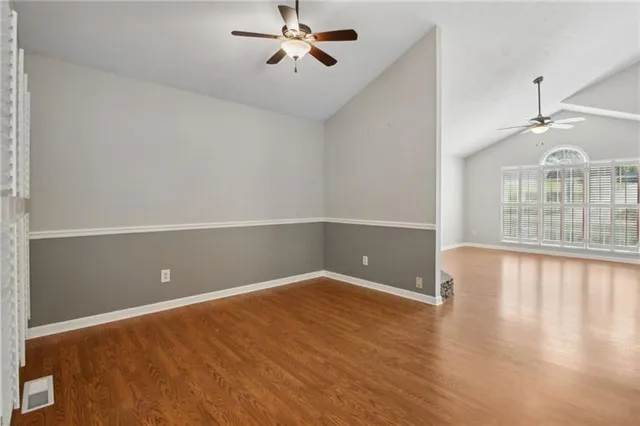 a kitchen with stainless steel appliances granite countertop a stove and a sink