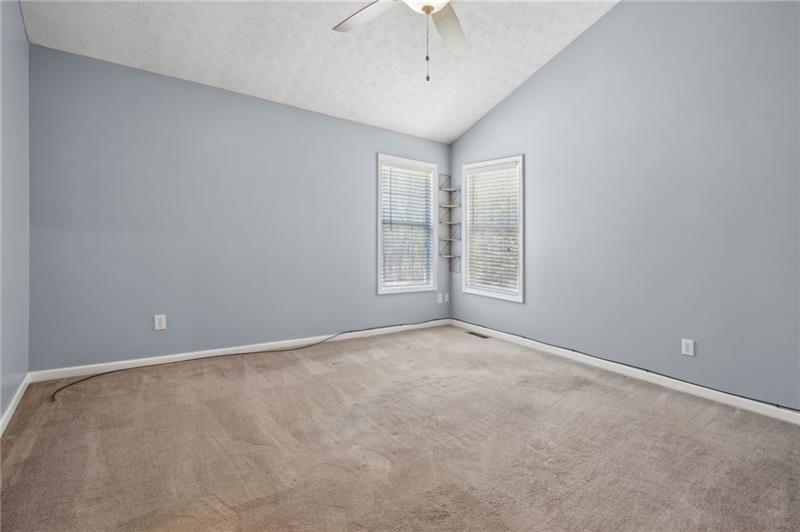 6604 Windbrook Way Flowery Branch, GA 30542 - Photo 28 of 64 a view of an empty room with a window