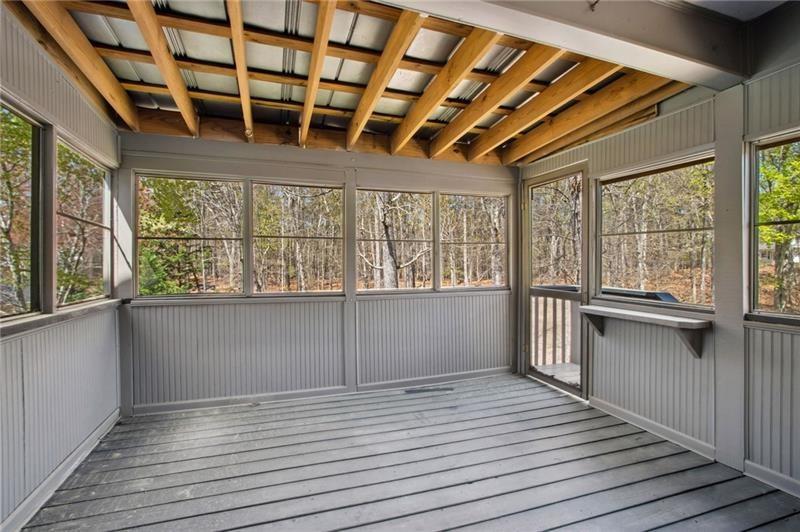 6604 Windbrook Way Flowery Branch, GA 30542 - Photo 51 of 64 a view of an empty room with a window