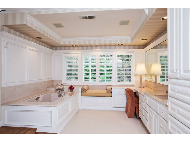 279 Park Lane Atherton, CA 94027 - Photo 21 of 25 a bathroom with a tub sink and mirror