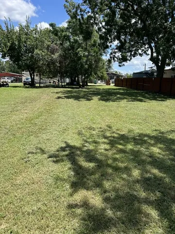 a view of a green yard