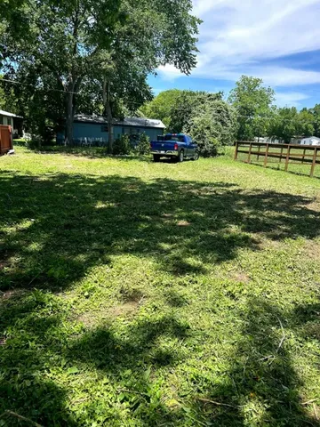a view of a golf course with a lake