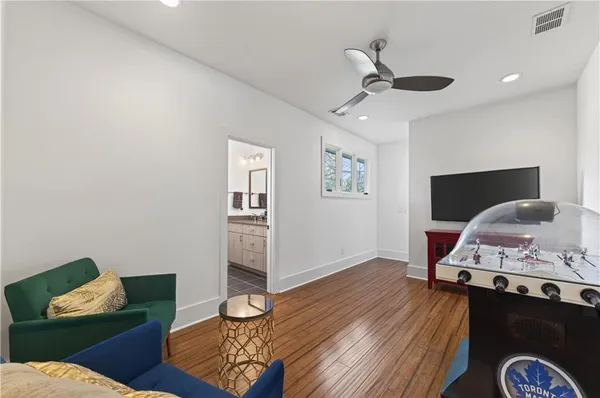 a bedroom with double bed and a window