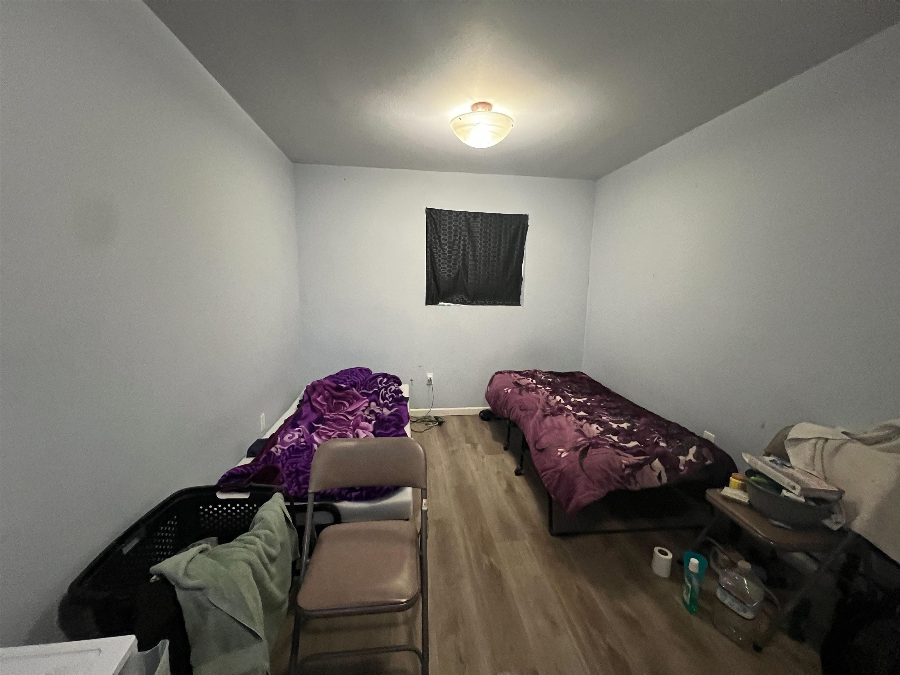 1803 Rosedale Avenue Oakland, CA 94601 - Photo 18 of 28 Bedroom with wood finished floors and baseboards